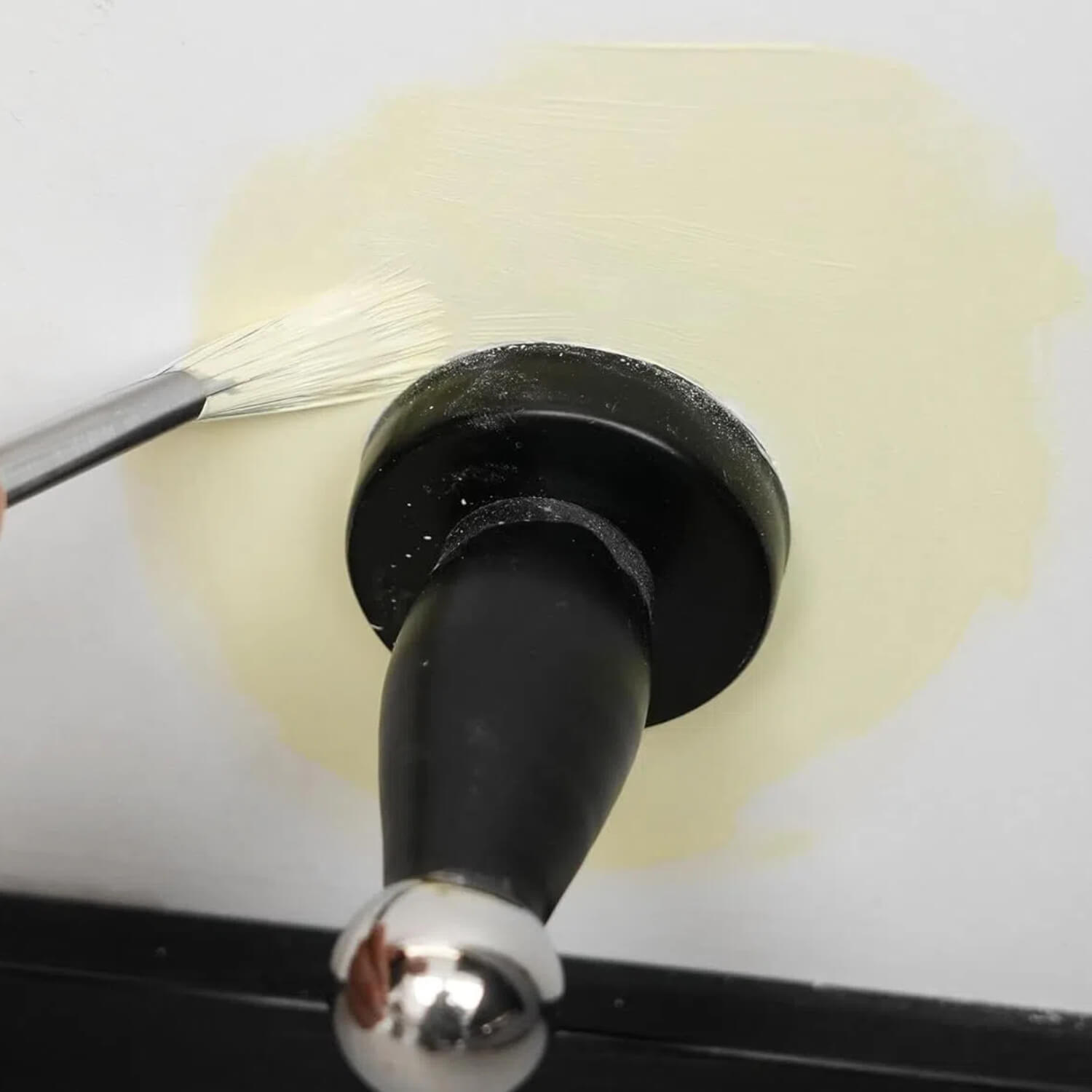DIY painter using ROLLINGDOG trim paint brush for precise cutting-in