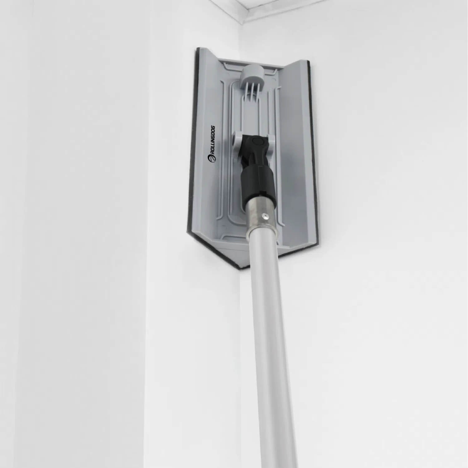 ROLLINGDOG corner sander attached to extension pole for sanding high wall corners